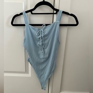 Revolve Privacy Please Light Blue Ribbed Tie Up Bodysuit